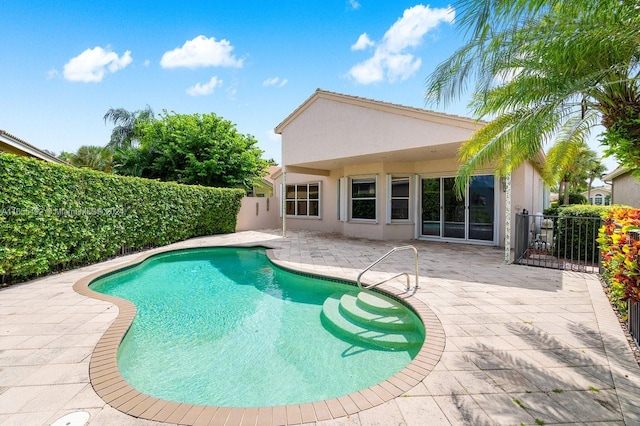 view of pool with a patio area