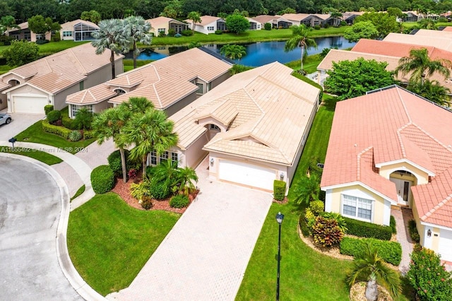 bird's eye view with a water view