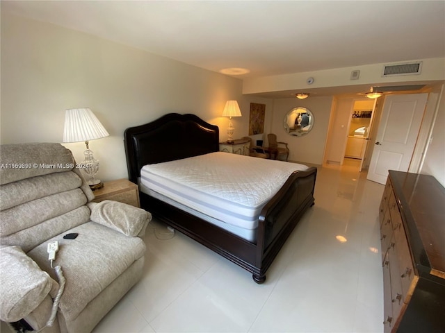 bedroom with light tile patterned flooring