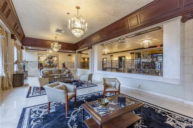 living room with a chandelier and tile patterned flooring