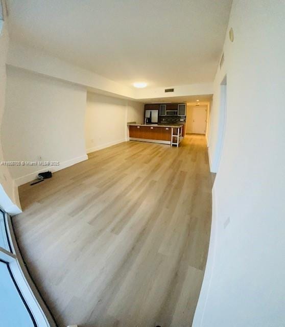 living room with light hardwood / wood-style floors