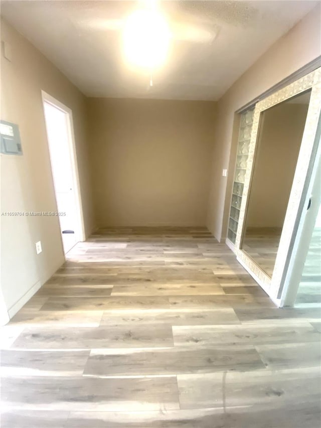 spare room with hardwood / wood-style flooring