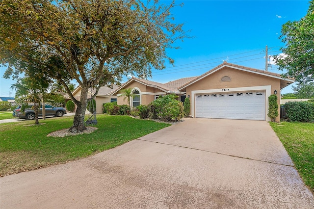 single story home with a garage, a front lawn, and central air condition unit