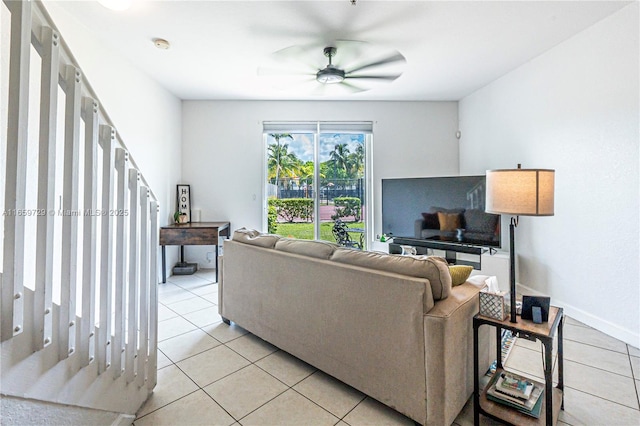 living room with light tile patterned floors and ceiling fan