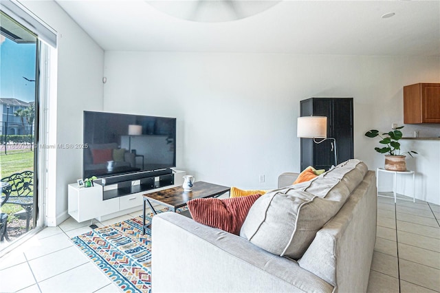 living room with light tile patterned flooring