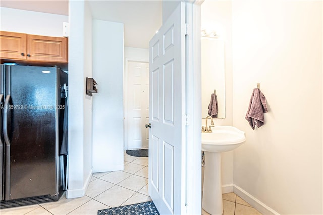 bathroom with tile patterned flooring