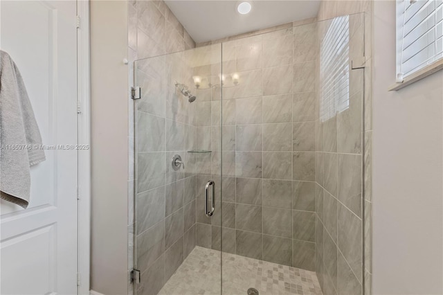 full bathroom featuring a stall shower