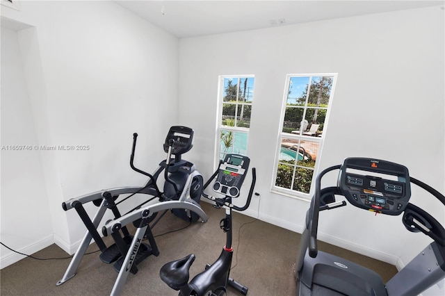 exercise area with baseboards