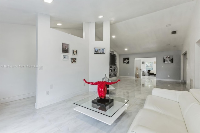 living room with vaulted ceiling