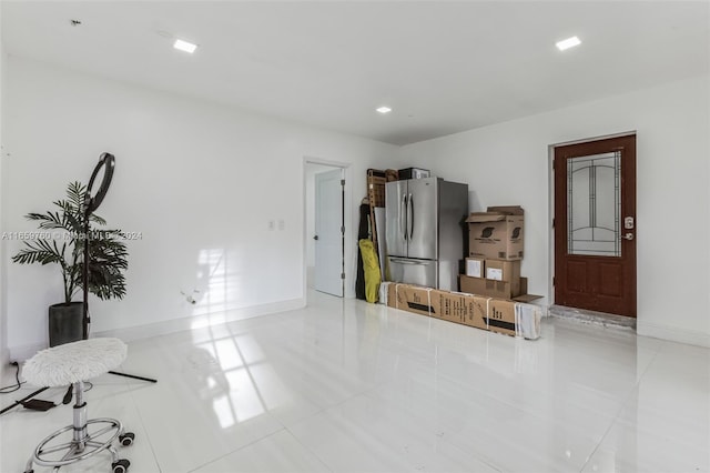 view of tiled foyer entrance