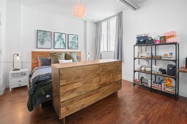 bedroom featuring dark wood-type flooring