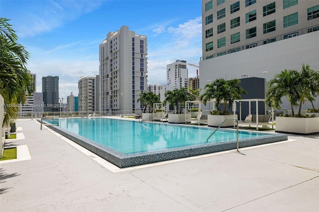 view of swimming pool featuring a patio