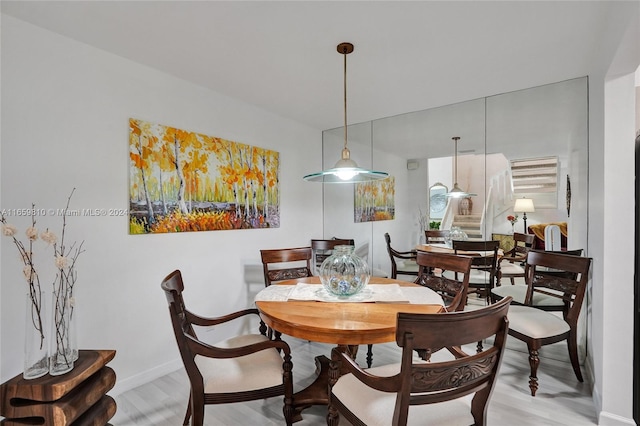 dining room featuring light hardwood / wood-style flooring