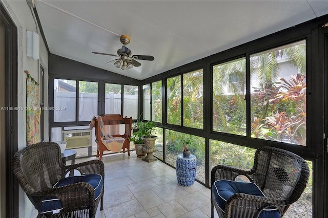 sunroom featuring lofted ceiling and ceiling fan