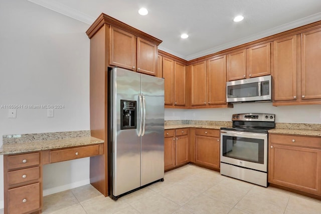 kitchen featuring light tile patterned floors, light stone countertops, appliances with stainless steel finishes, and ornamental molding