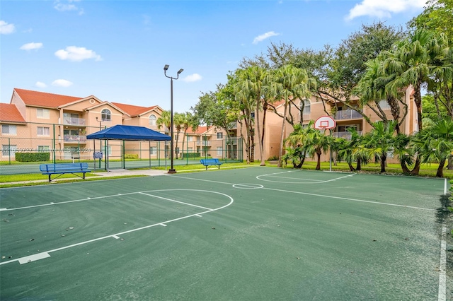 view of sport court with tennis court