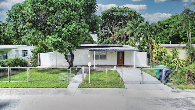 view of front of home with a front yard