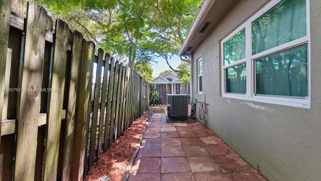 view of property exterior with central air condition unit