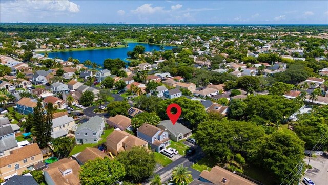 drone / aerial view with a water view