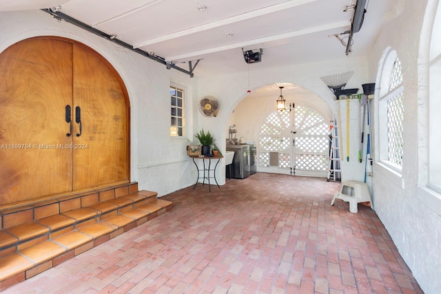 interior space featuring french doors and washer and clothes dryer