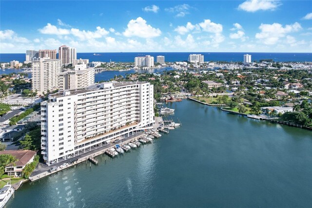 birds eye view of property featuring a water view