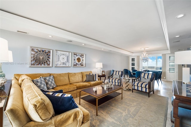 living room with a notable chandelier