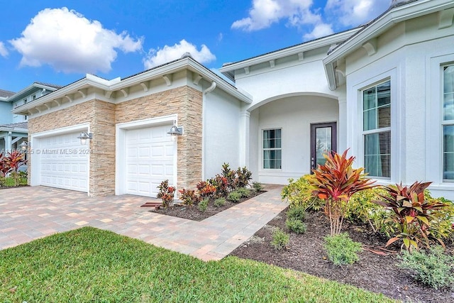 view of front of property with a garage