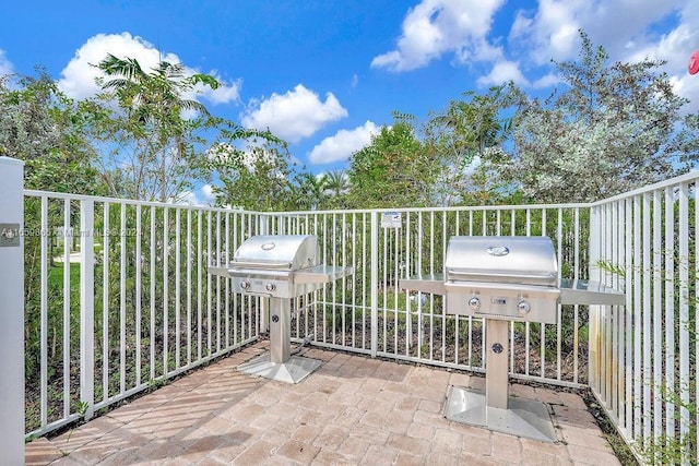 balcony featuring a grill