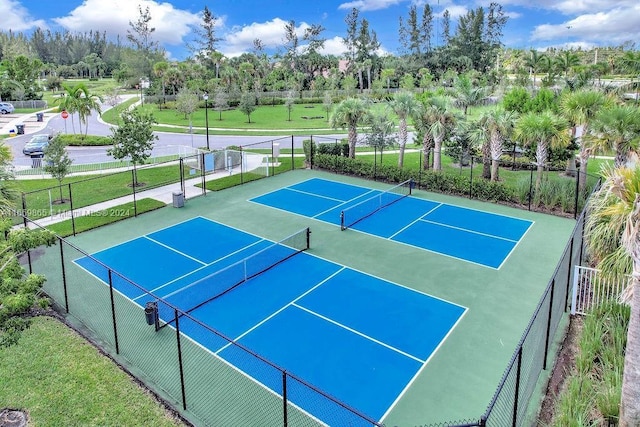 view of tennis court featuring basketball court