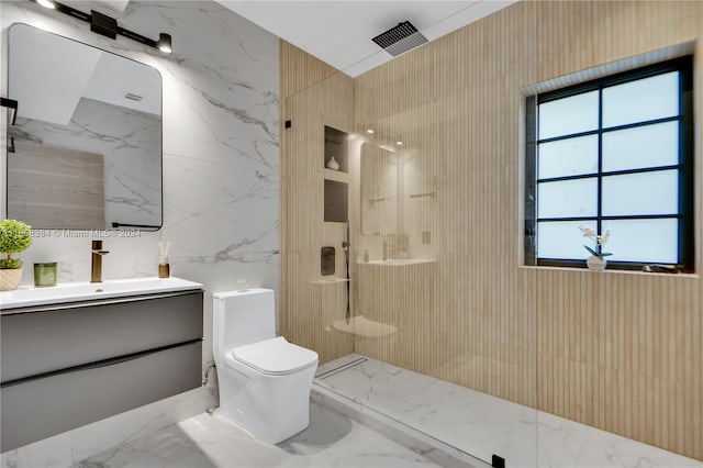 bathroom featuring walk in shower, a healthy amount of sunlight, vanity, and toilet