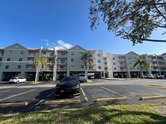 8240 SW 210th St Unit 302, Cutler Bay, FL 33189 - view of apartment building / complex with uncovered parking