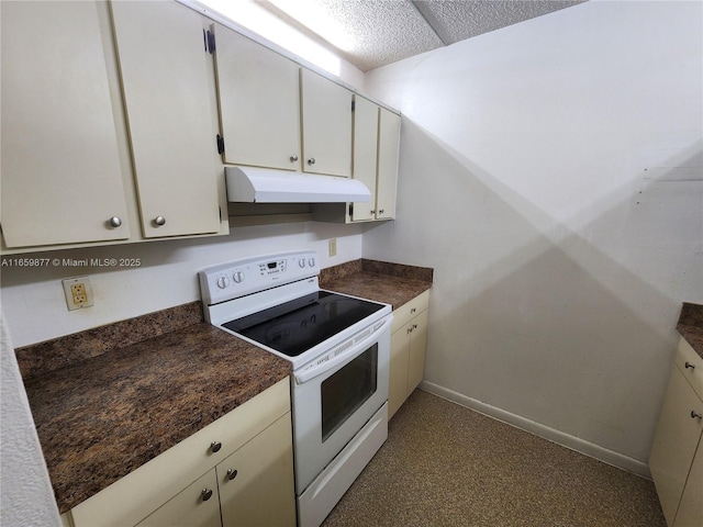 8240 SW 210th St Unit 302, Cutler Bay, FL 33189 - kitchen featuring electric stove, under cabinet range hood, dark countertops, and white cabinets