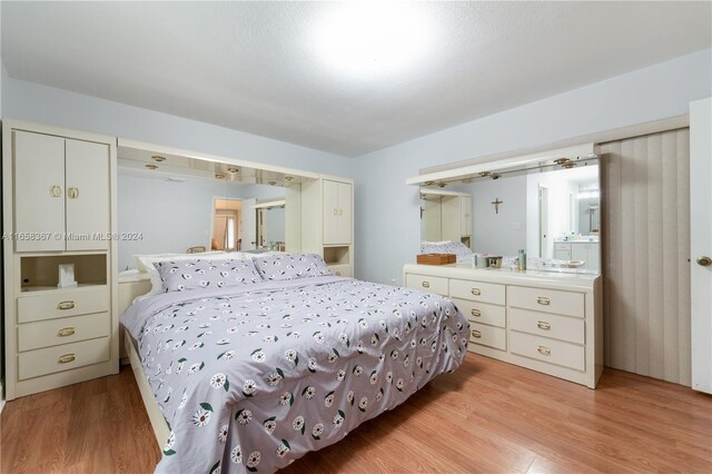 bedroom featuring light wood-type flooring