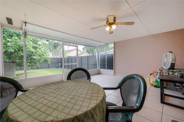 interior space featuring ceiling fan