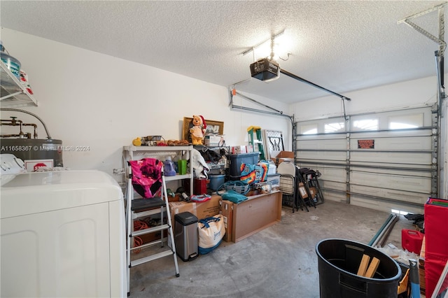 garage with washer and dryer, water heater, and a garage door opener