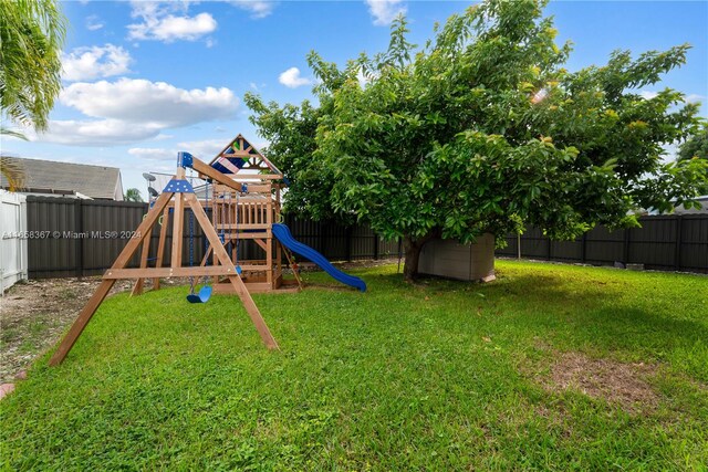 view of yard featuring a playground