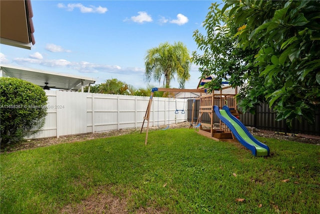 view of yard with a playground