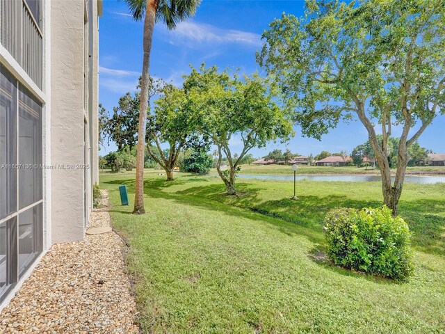 view of yard featuring a water view