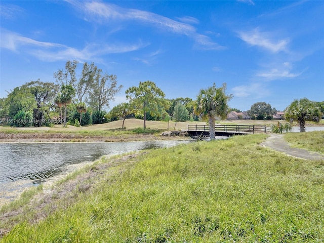 exterior space with a water view and a rural view