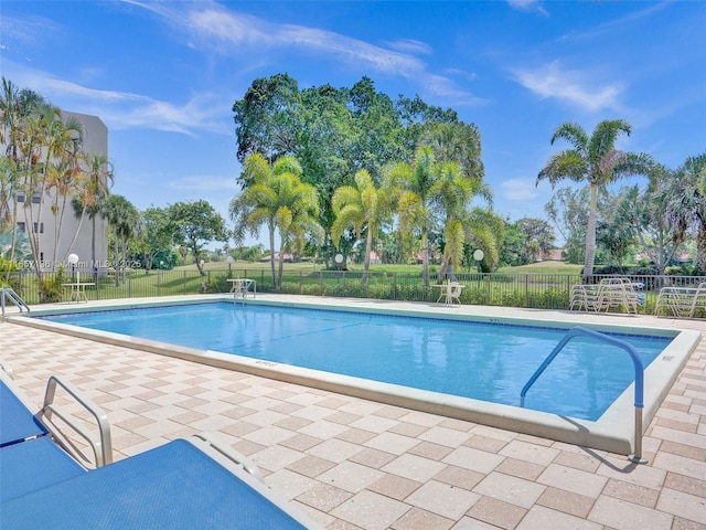 view of pool featuring a patio area