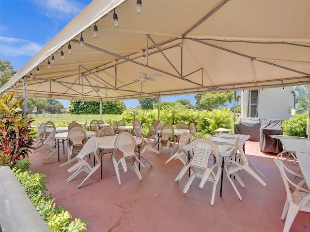 view of patio / terrace featuring ceiling fan