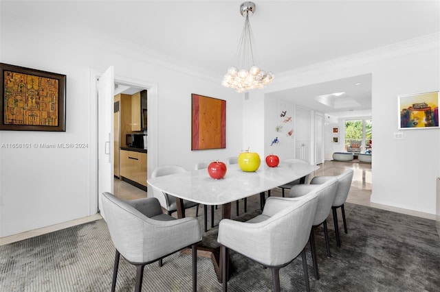 carpeted dining area with ornamental molding and a chandelier