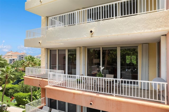 rear view of house with a balcony