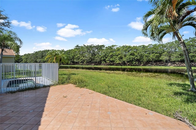 view of patio / terrace featuring a water view