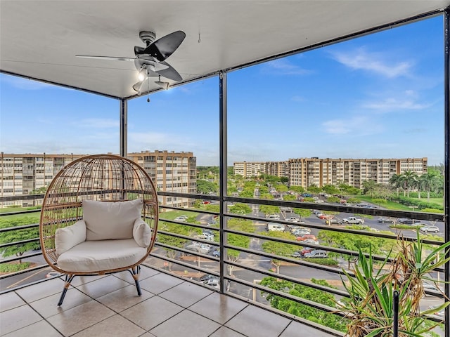 exterior space featuring ceiling fan