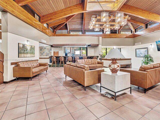 900 Saint Charles Pl Unit 718, Pembroke Pines, FL 33026 - community lobby featuring a wood ceiling with exposed beams and high vaulted ceiling