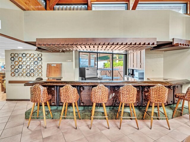 kitchen with light tile patterned floors