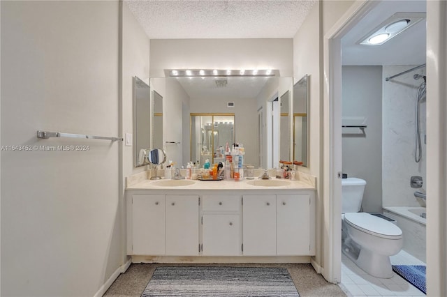 full bathroom with toilet, shower / tub combination, vanity, and a textured ceiling