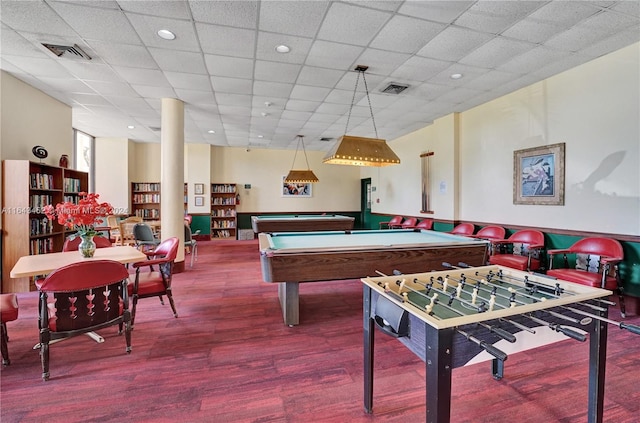 rec room with a paneled ceiling, billiards, and hardwood / wood-style floors