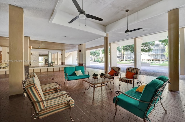 view of patio / terrace featuring ceiling fan